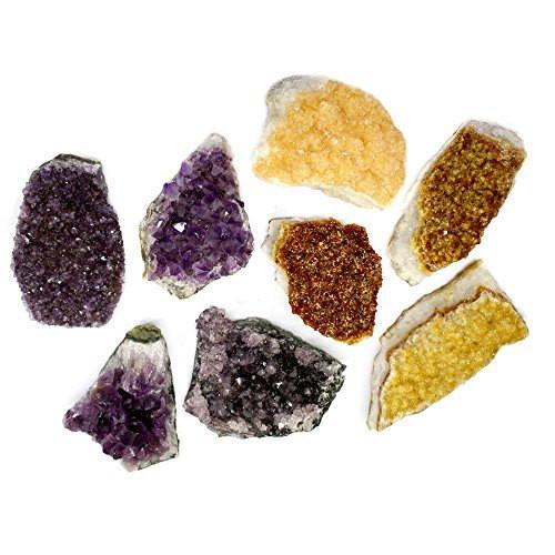 citrine and amethyst pieces on a table