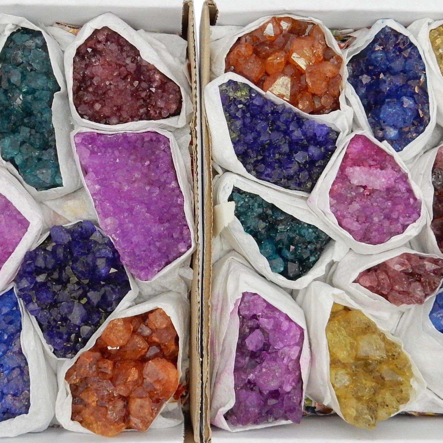 Two dyed amethyst boxes side by side on a white background