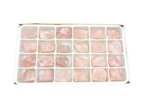 box of Rose Quartz on white background
