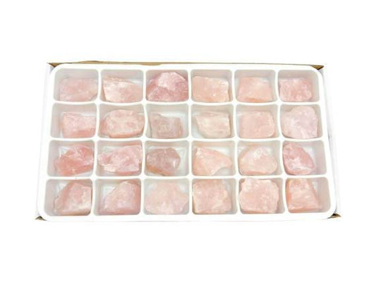 box of Rose Quartz on white background