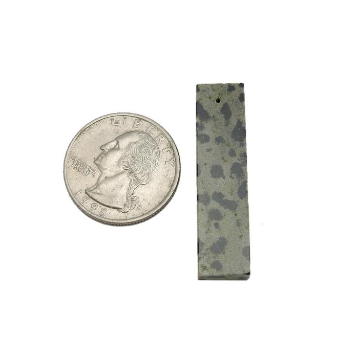 Gemstone Bar Bead displayed next to quarter for size reference