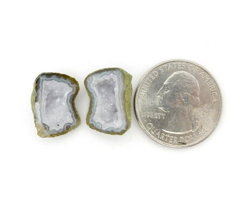 Geode Druzy Pair next to a quarter for size reference