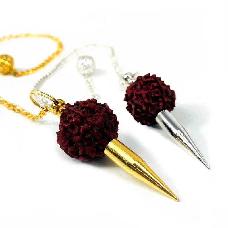 Two radruska pendulums on a white background.