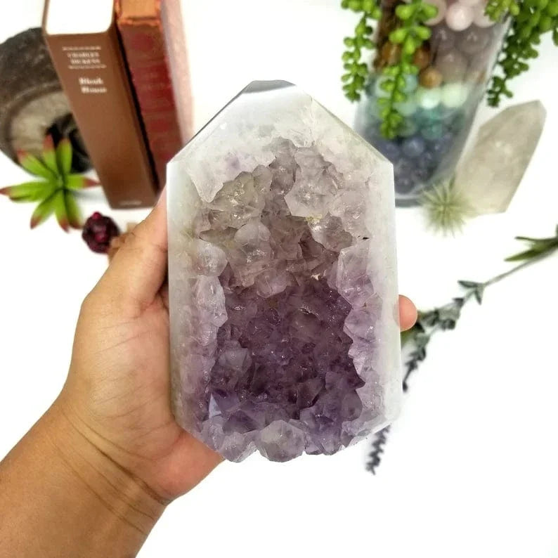 Amethyst Geode Druzy Polished Cut Base in a hand for size reference