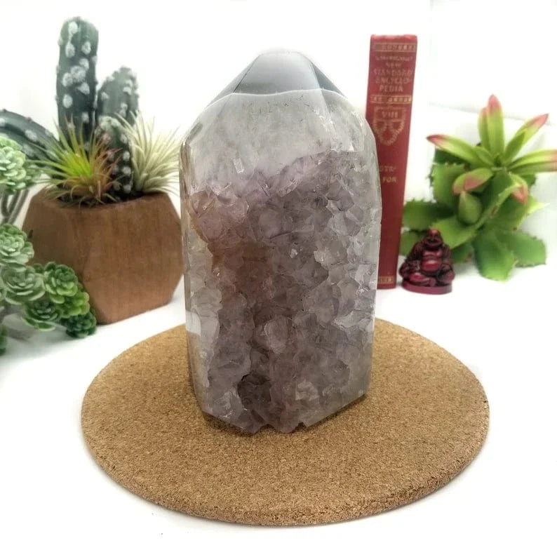 Amethyst Cut Base Cluster in home setting