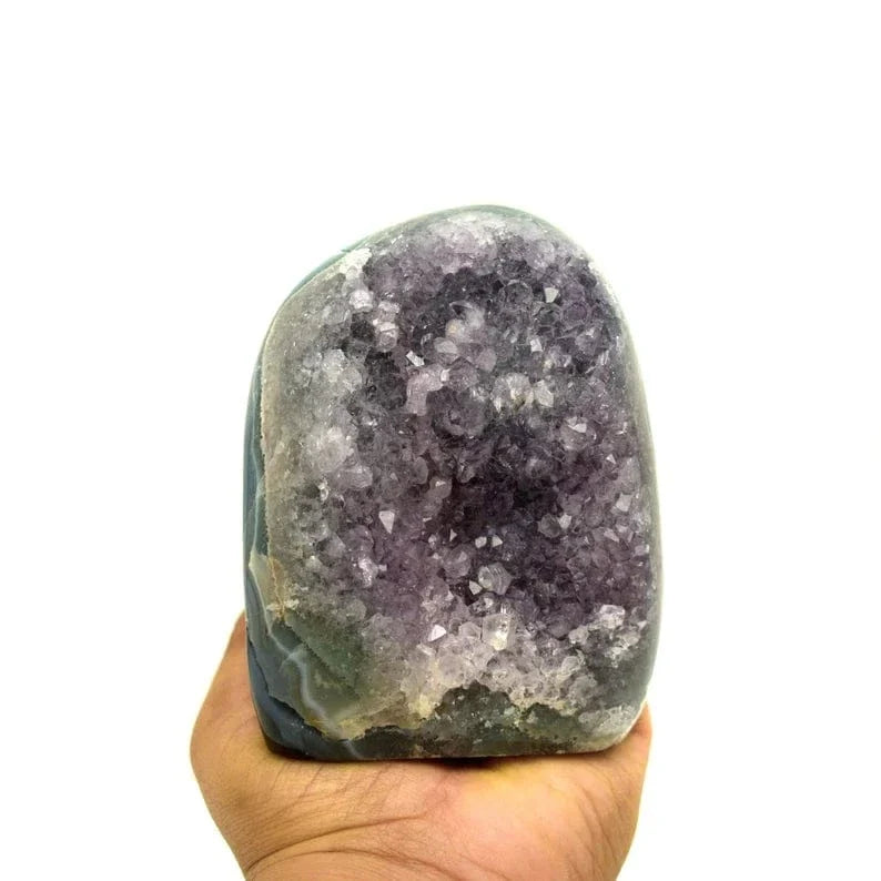 Amethyst Cut Base in a hand for size reference