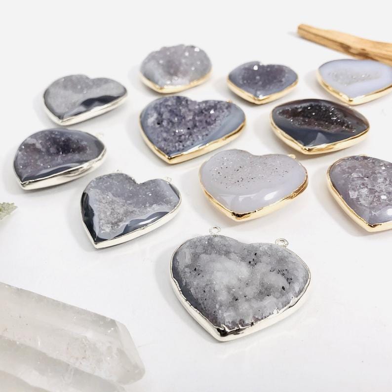 An angled view of Agate Druzy Hearts to show heart thickness.