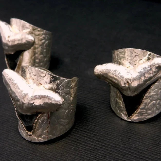 Black Shark Tooth Ring with Electroplated Silver Adjustable Hammered Bands shown up close