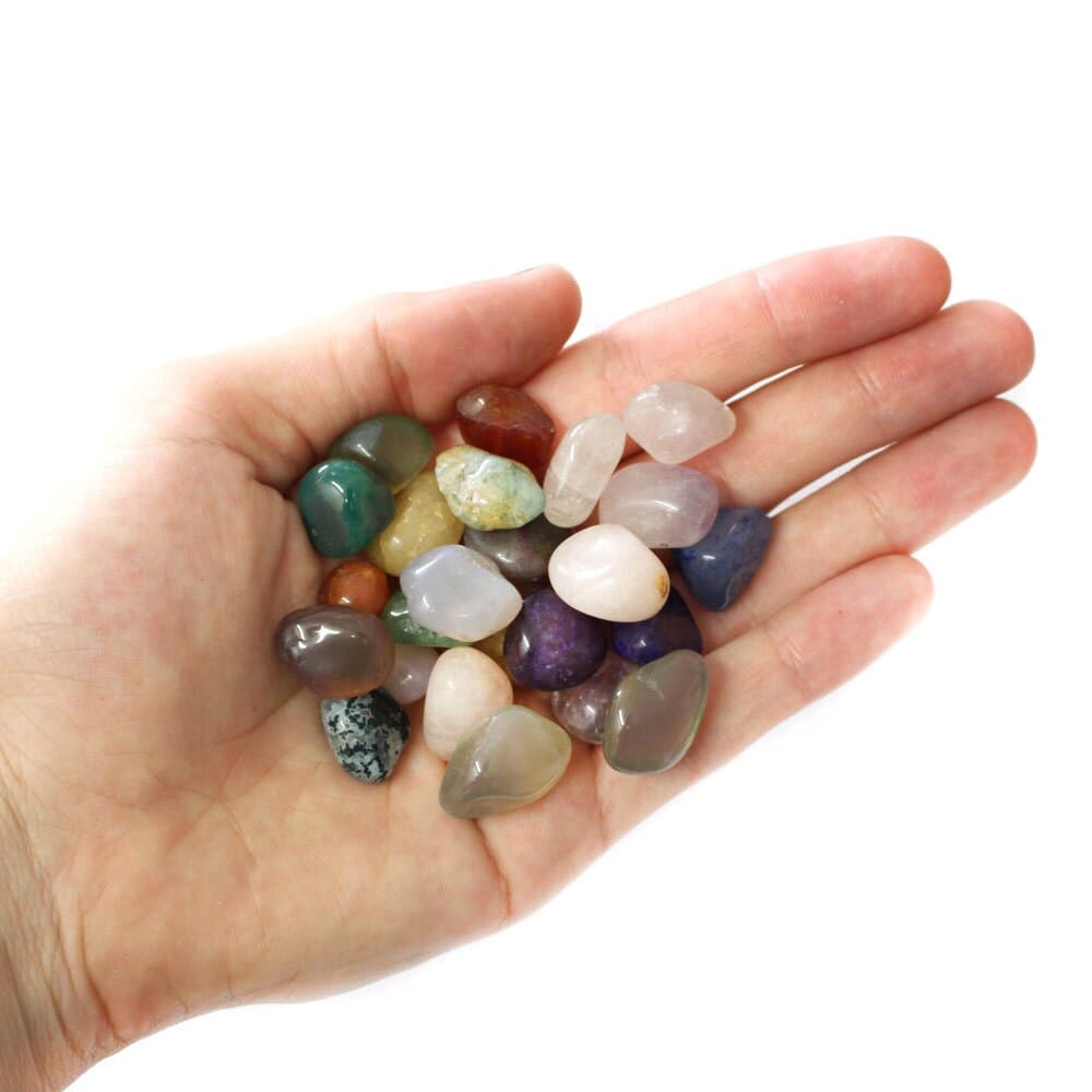 Mixed Small Tumbled Crystals Gemstones Bag crystals in hand for size reference