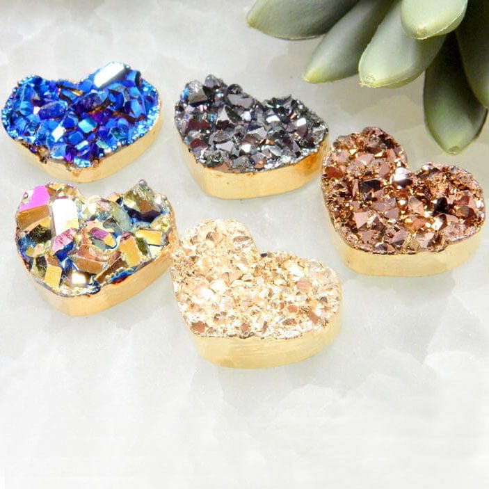 Mystic Druzy Heart Pendants with Electroplated 24k Gold Edge from a side view showing the thickness