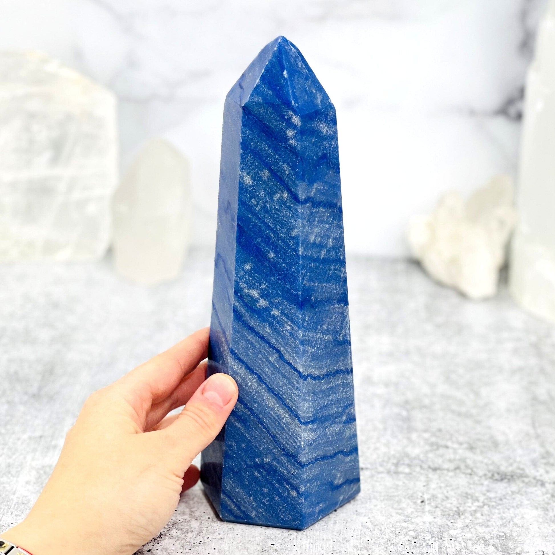 blue quartz with decorations in the background