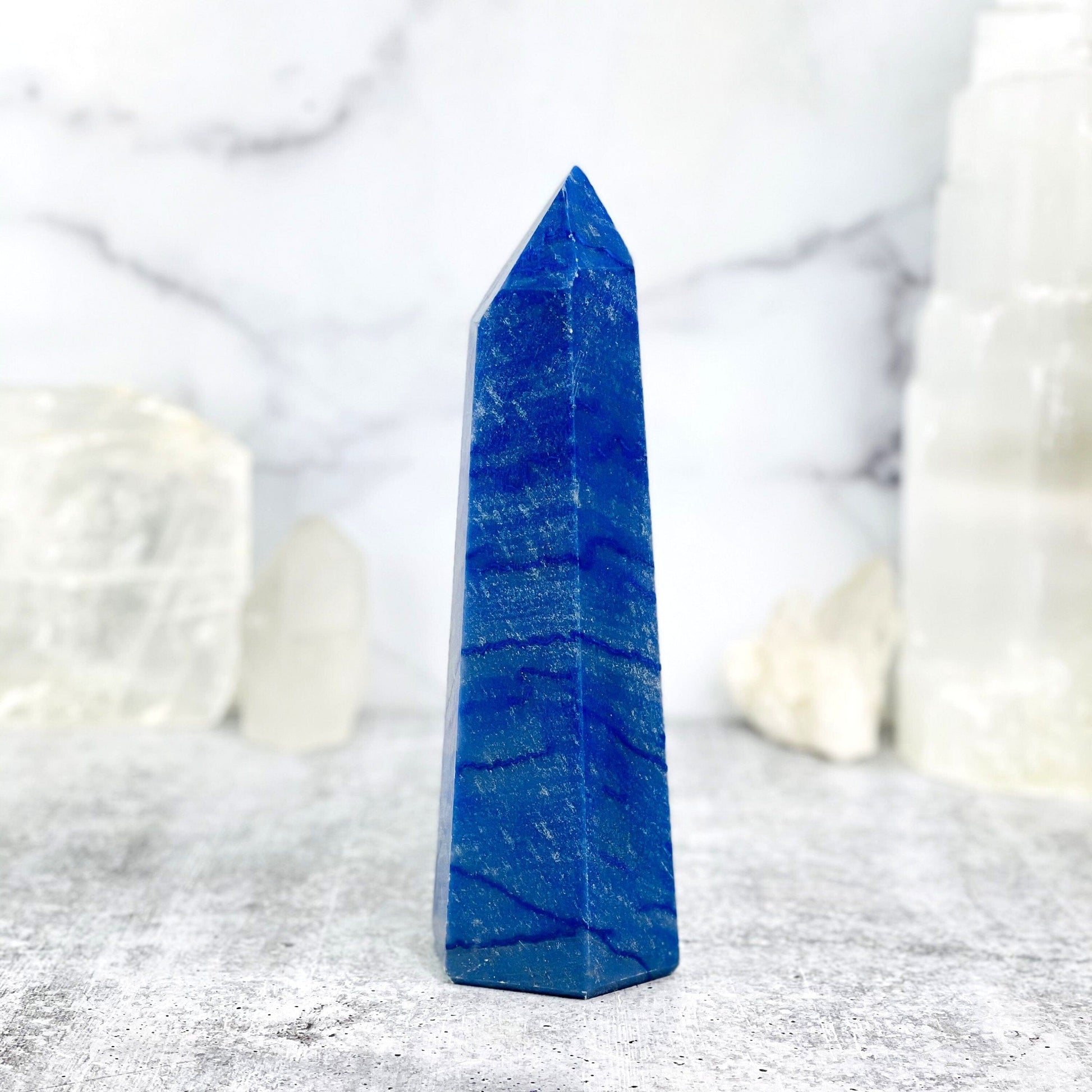 blue quartz with decorations in the background