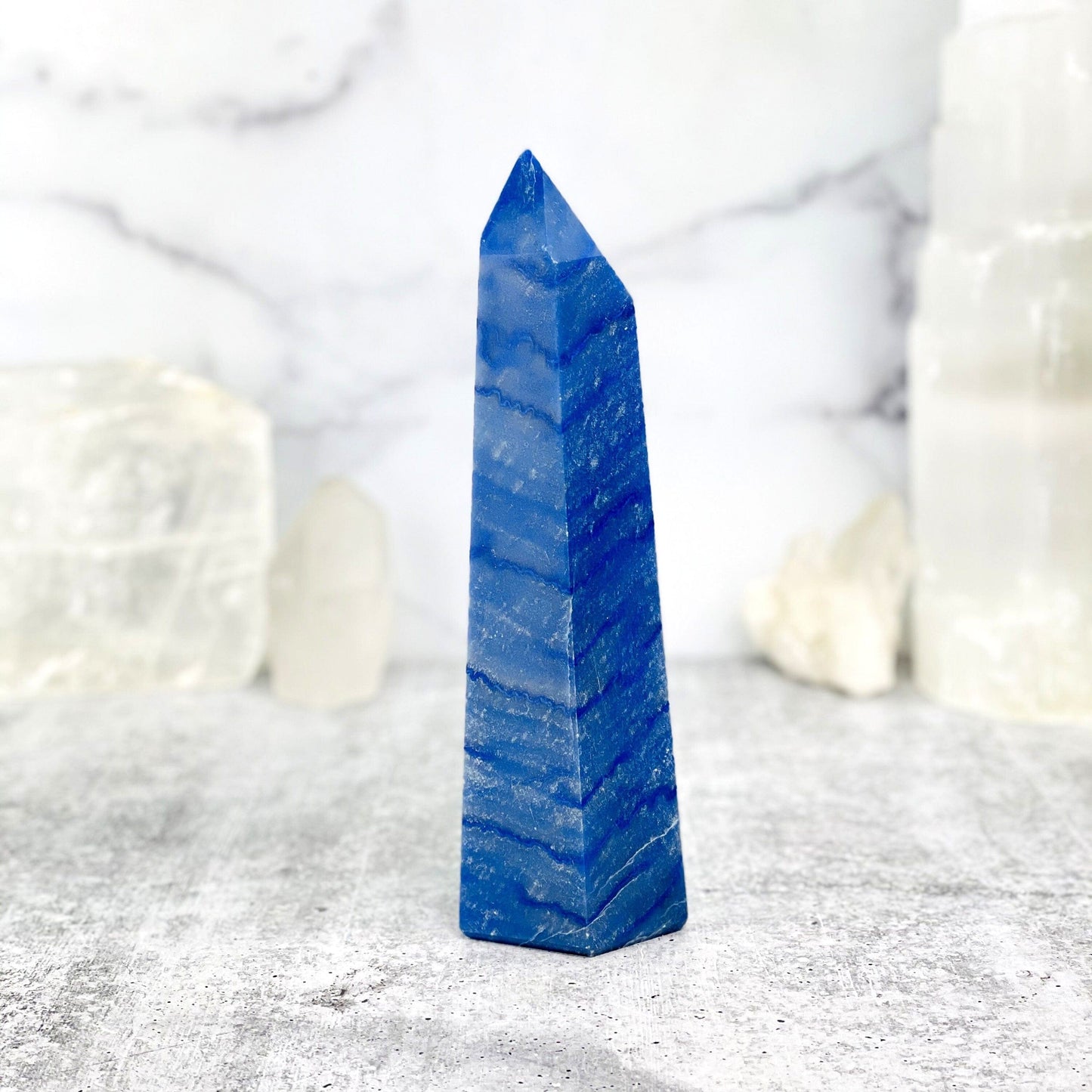 blue quartz with decorations in the background
