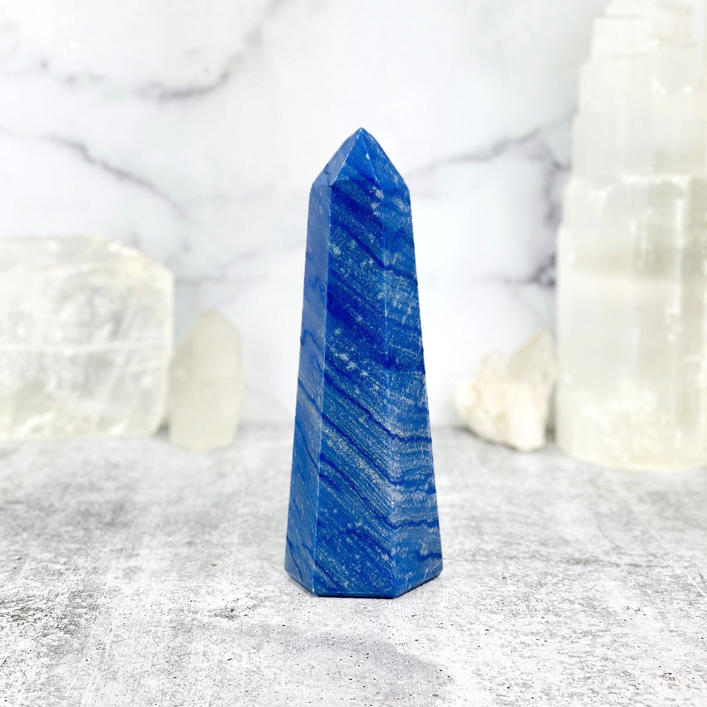 blue quartz with decorations in the background
