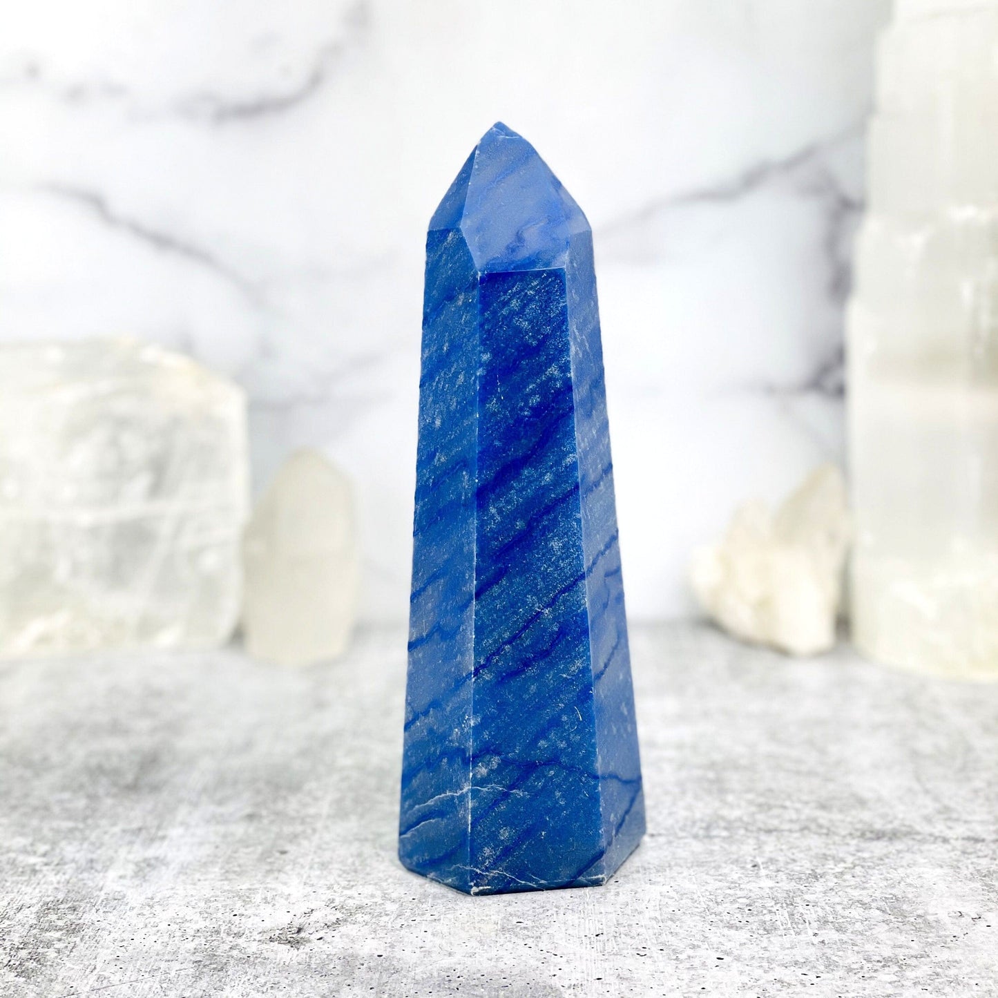 blue quartz with decorations in the background