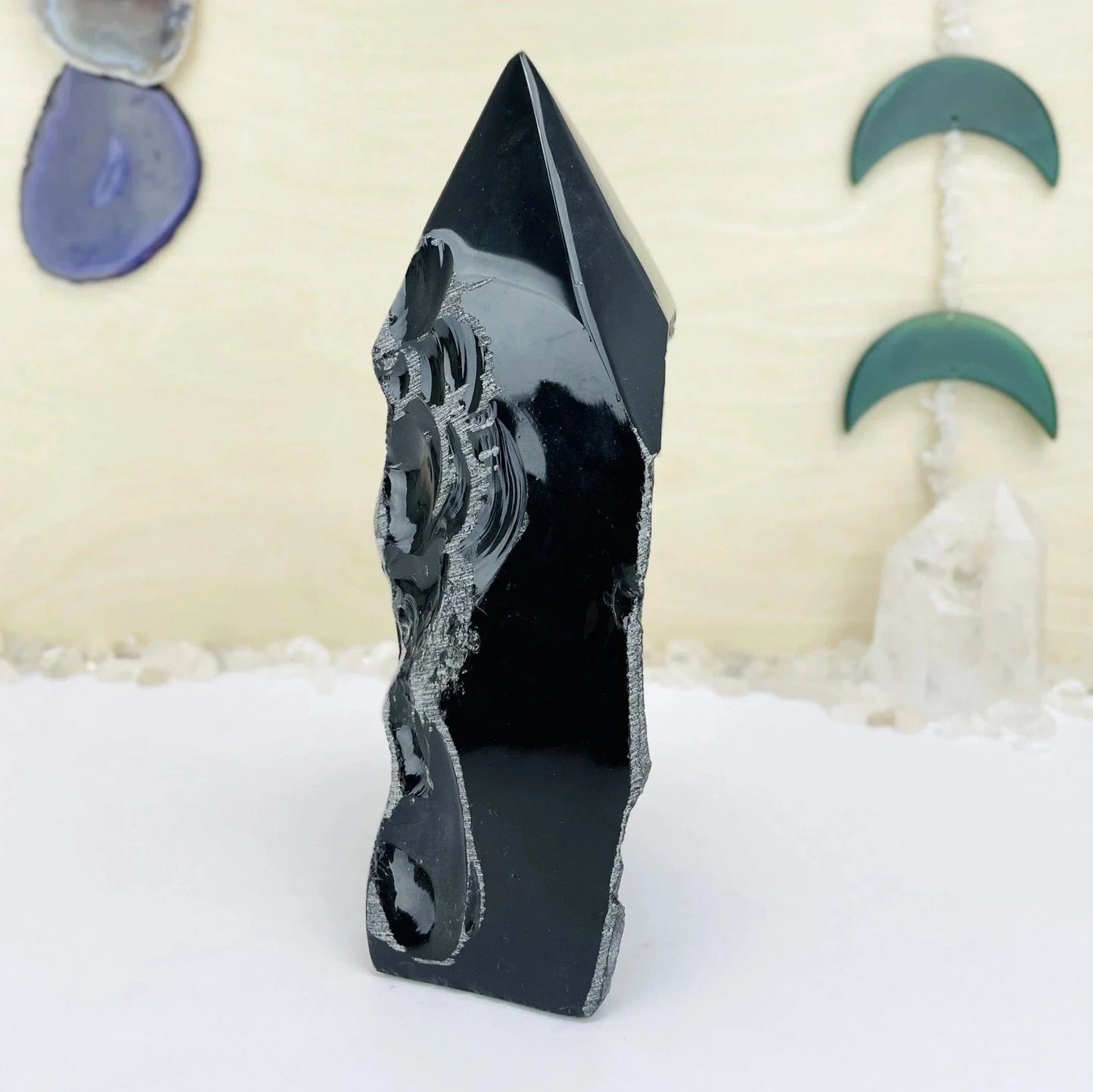 obsidian with decorations in the background