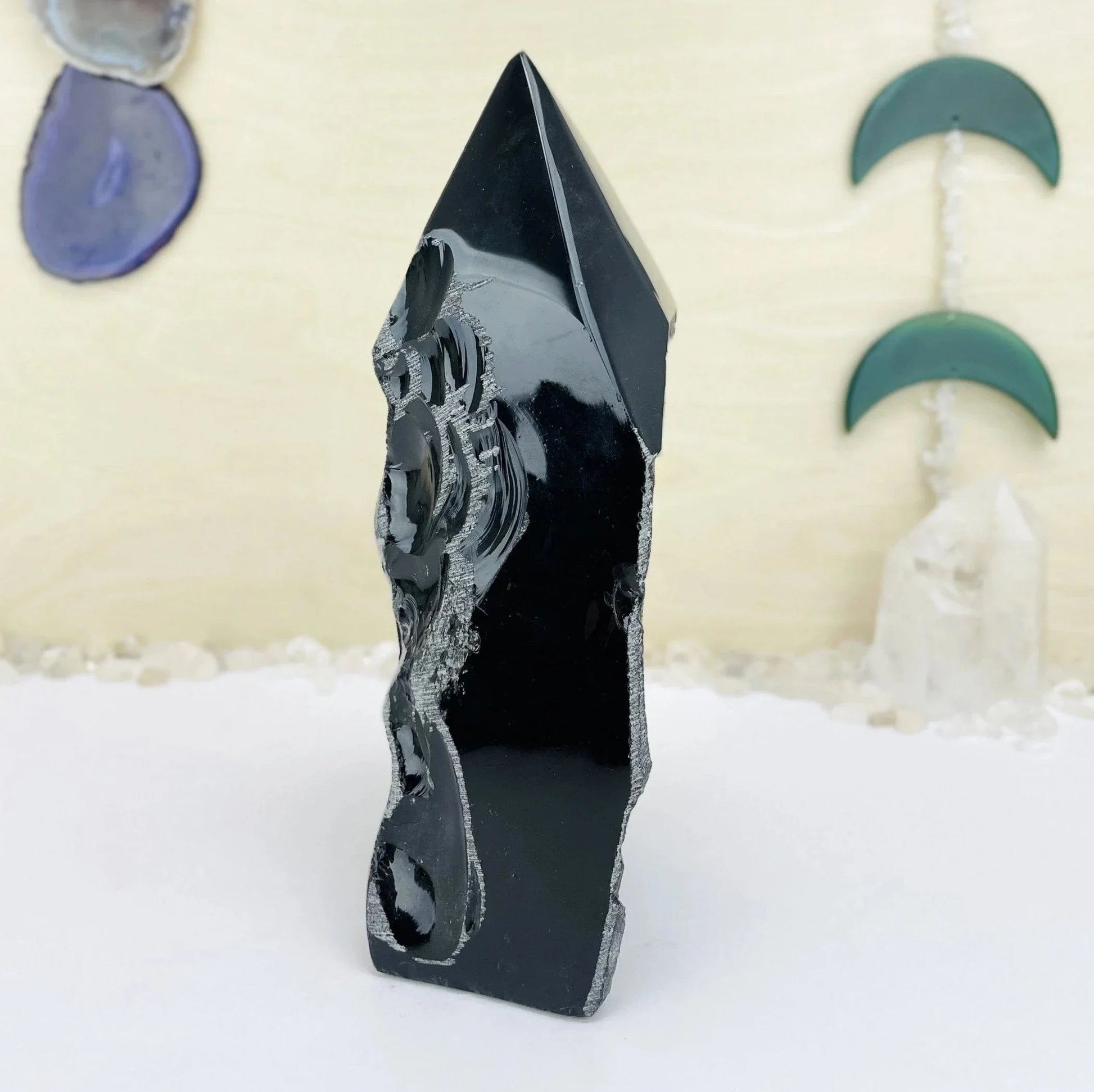 obsidian with decorations in the background