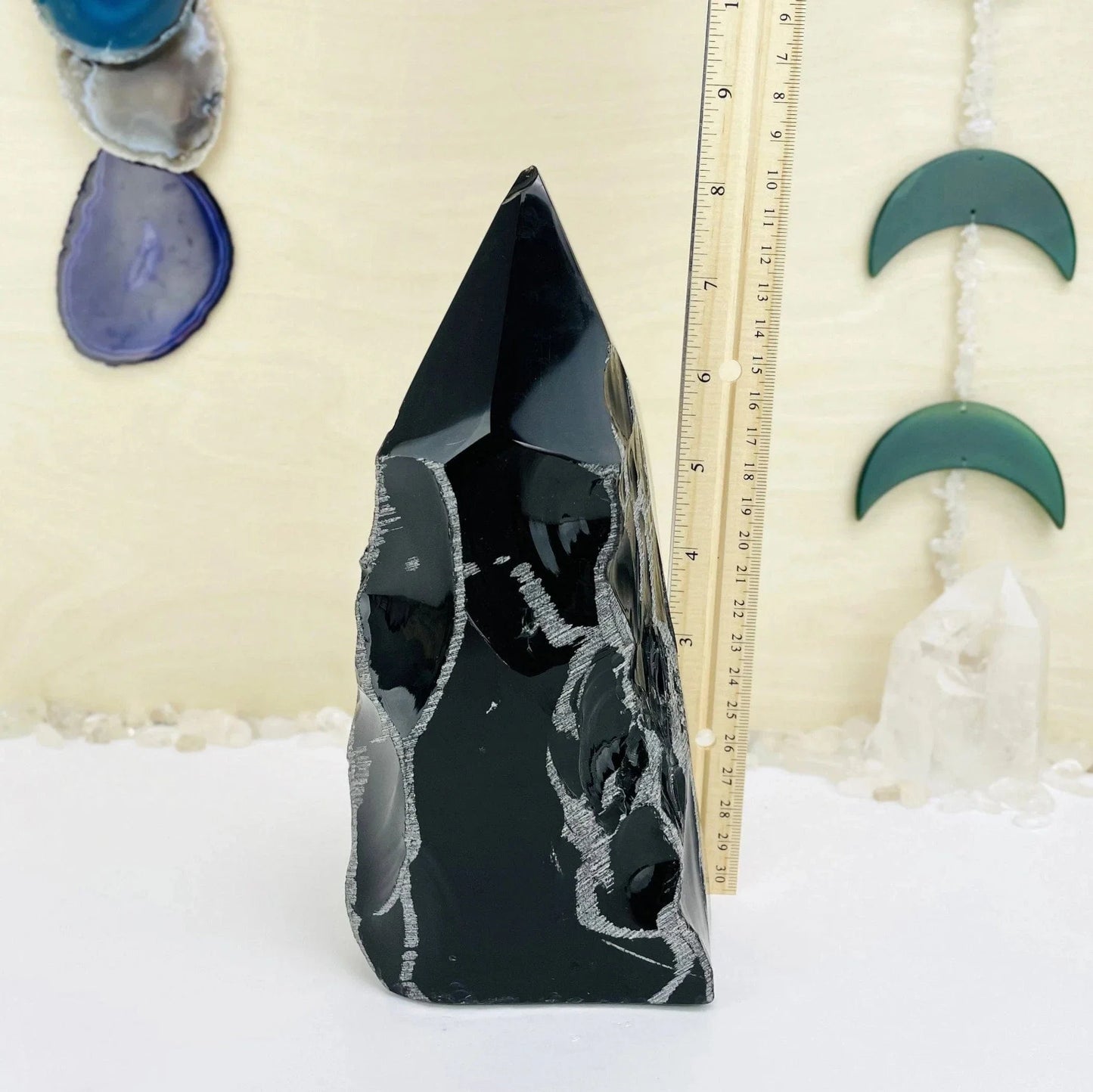 obsidian with decorations in the background