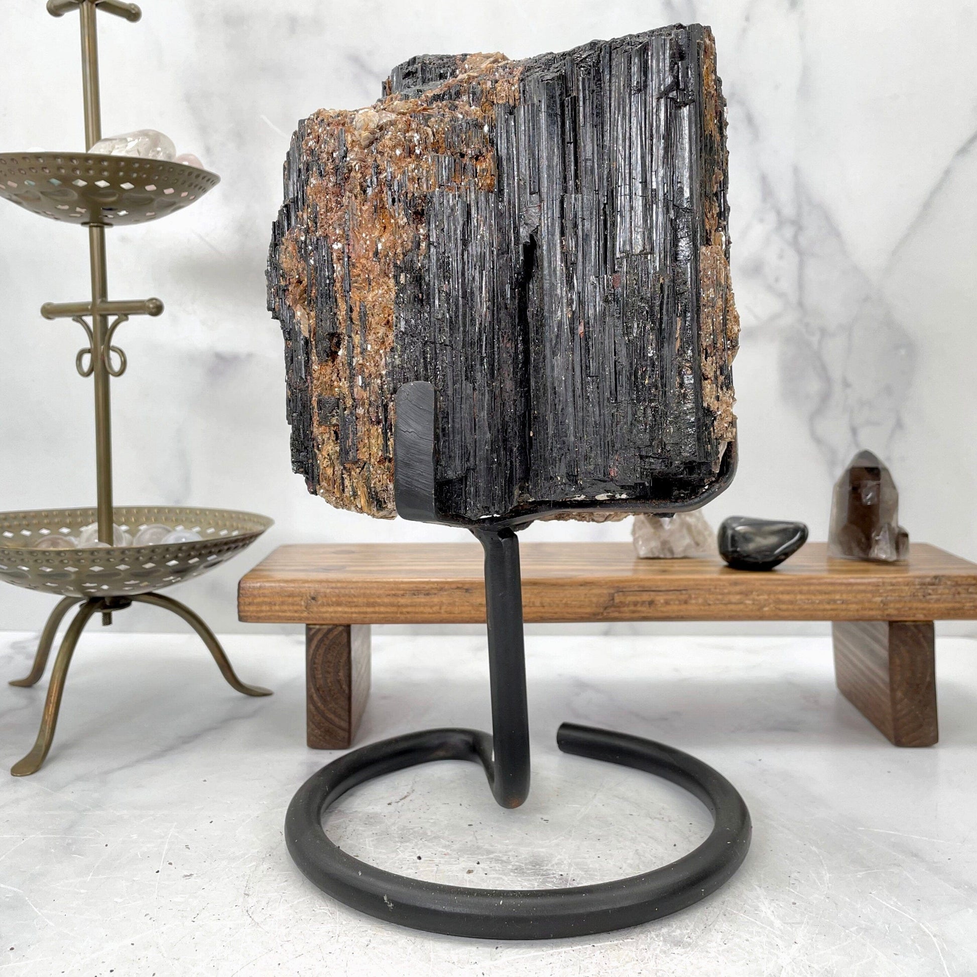 tourmaline with decorations in the background