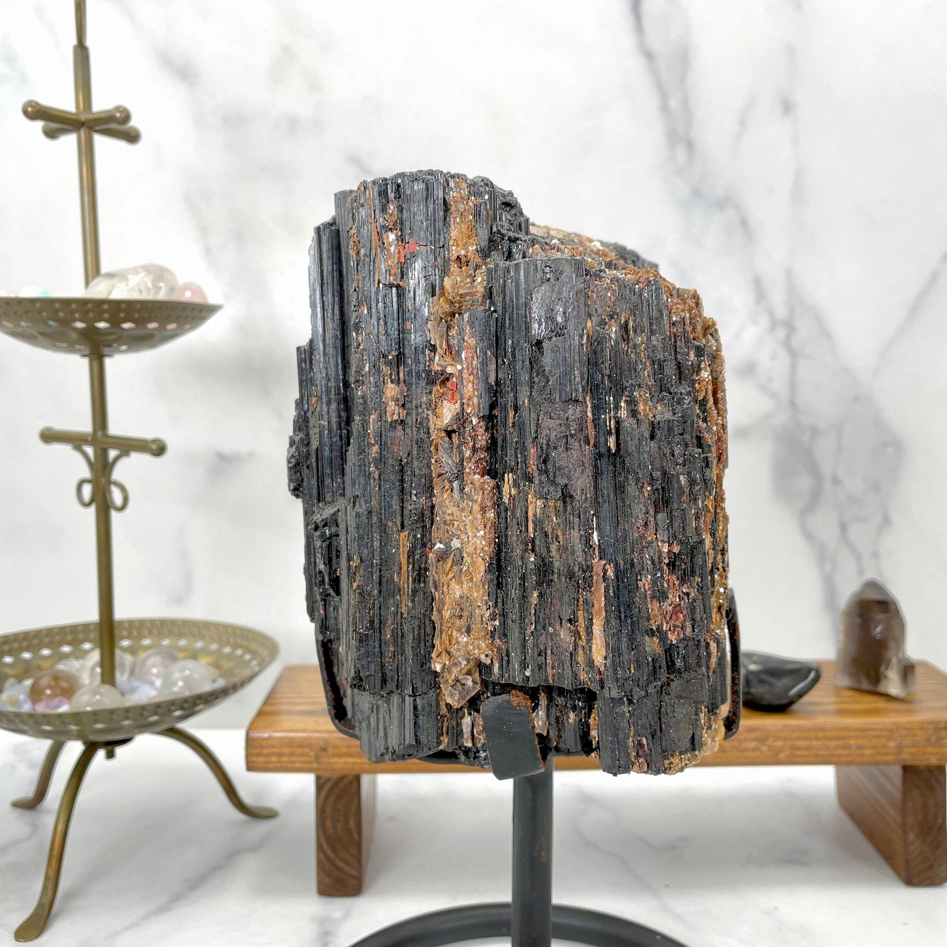 tourmaline with decorations in the background