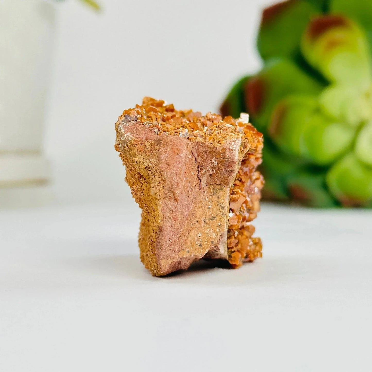 vanadinite with decorations in the background
