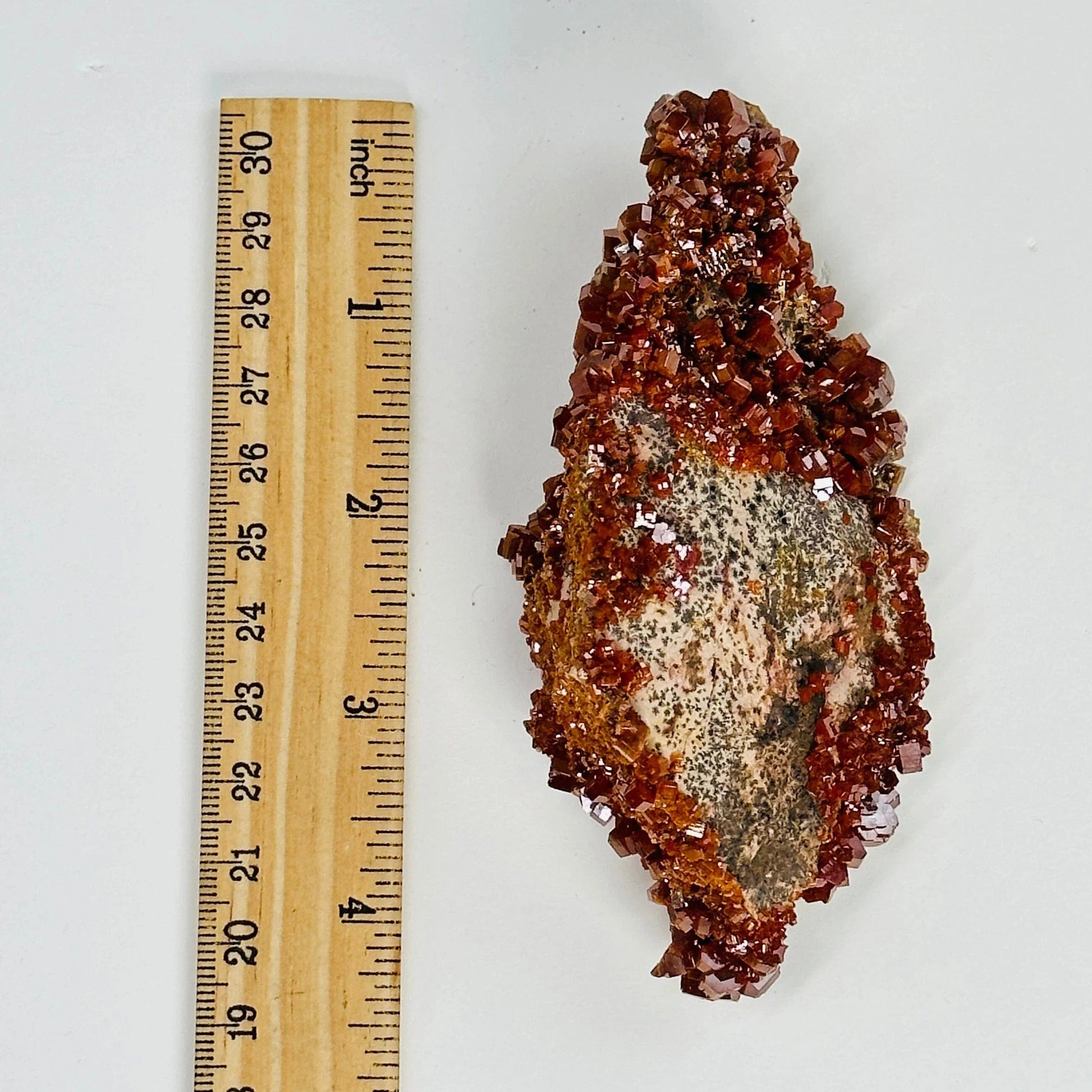 vanadinite with decorations in the background