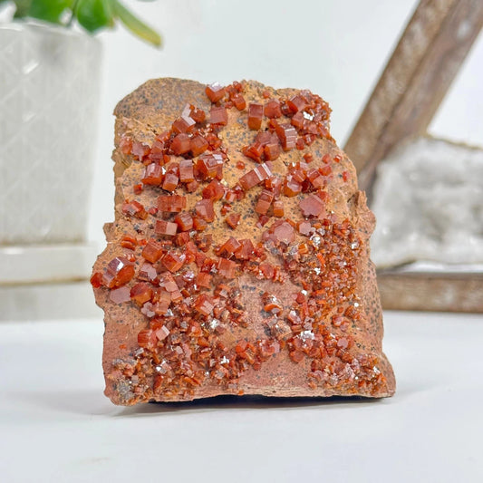 vanadinite with decorations in the background