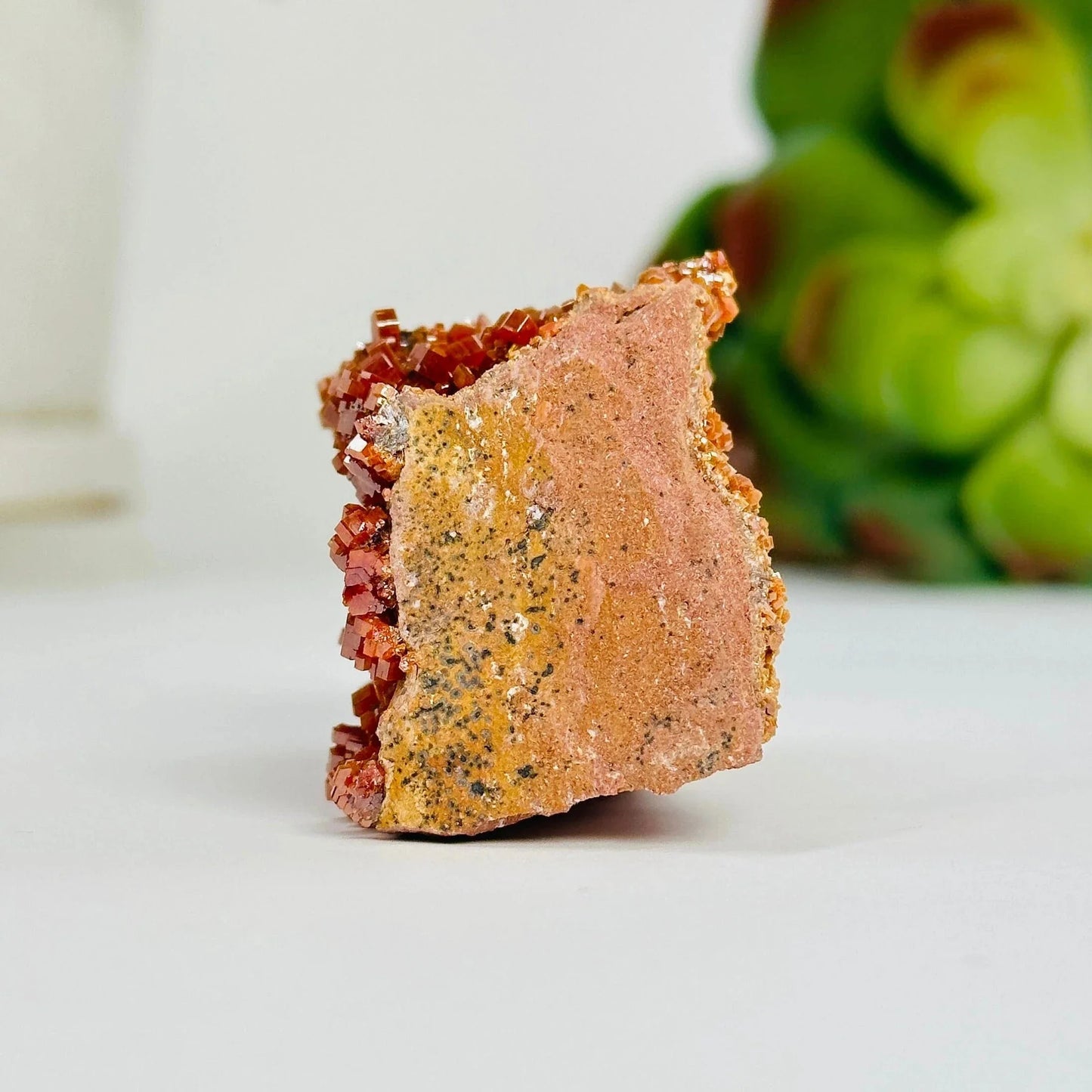 vanadinite with decorations in the background