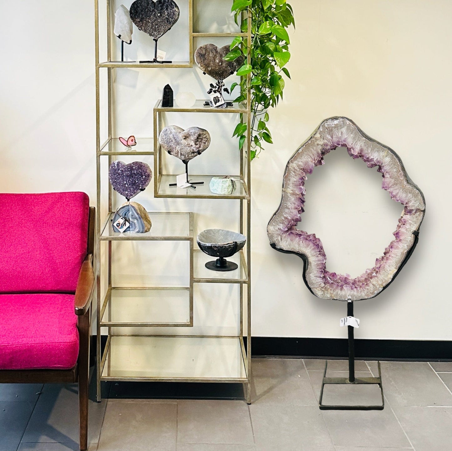 Large Amethyst Portal on Metal Stand next to decorations