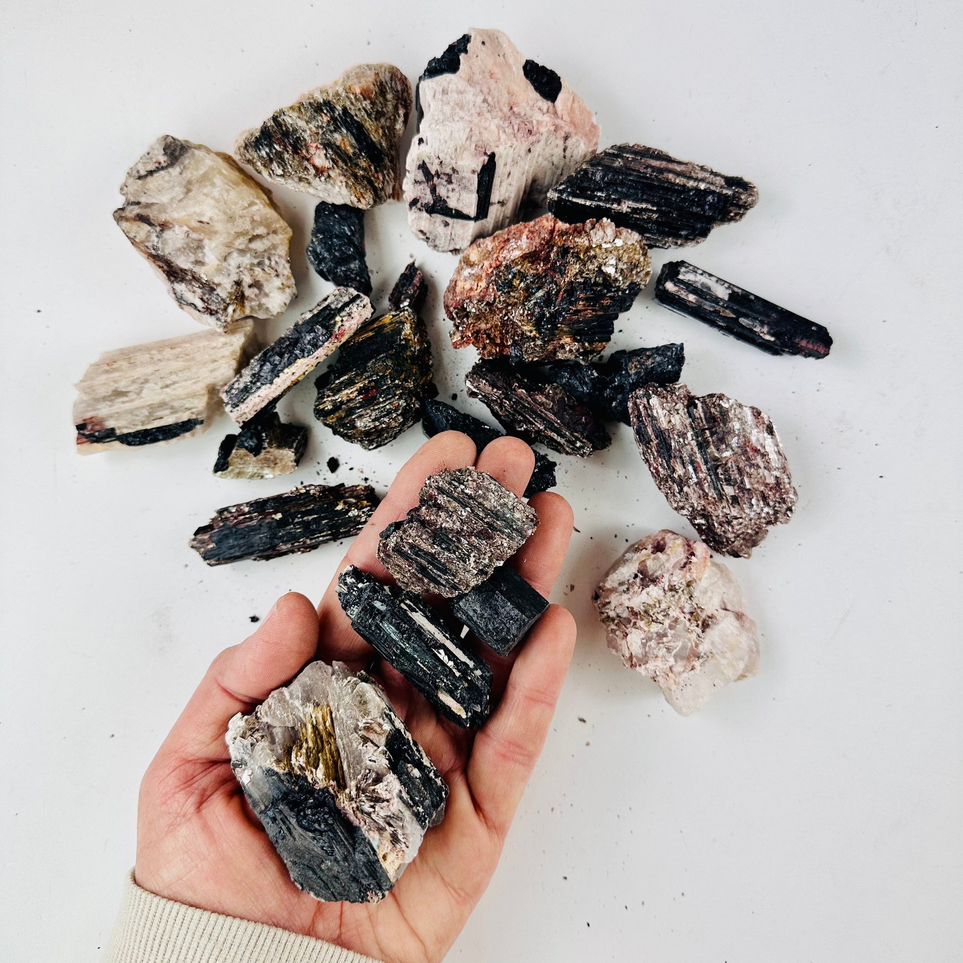 Black Tourmaline, on Matrix and Mica - Rough Assorted Size - 1 KILO worth with some in a hand for size reference