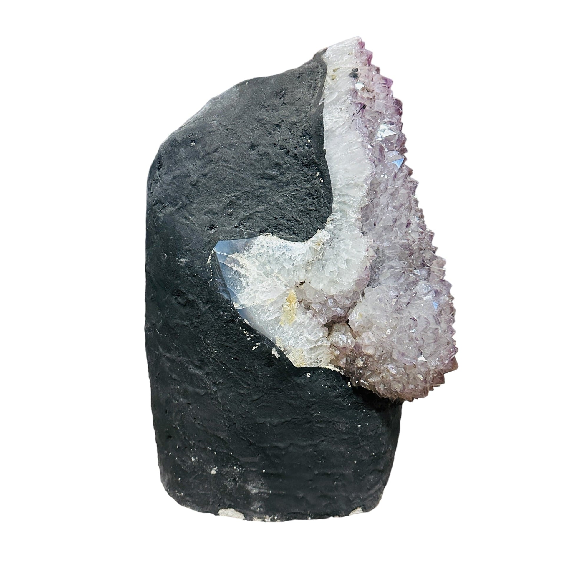 side view of amethyst decoration on white background