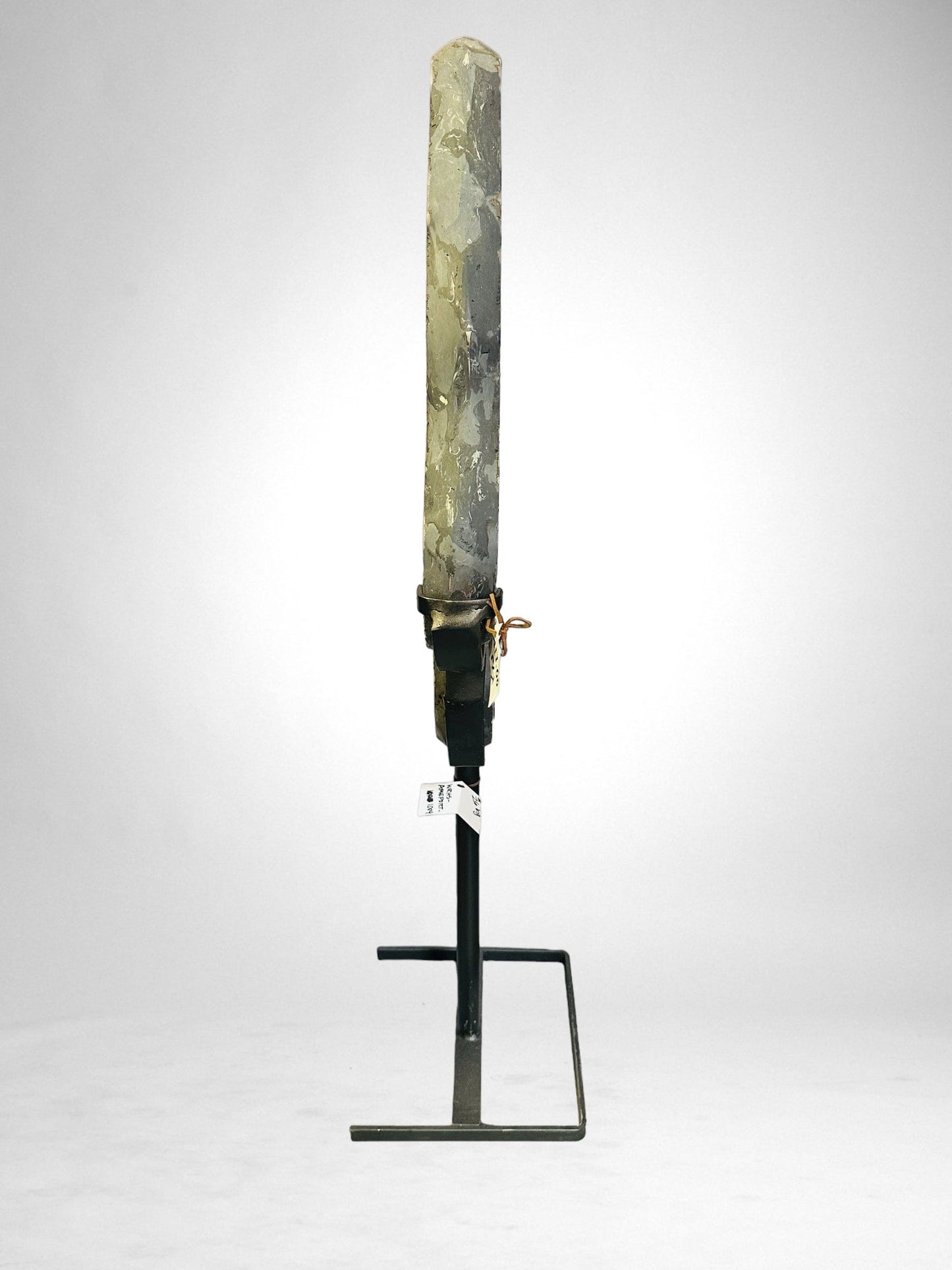 side view of Large Amethyst Portal on Metal Stand on white background