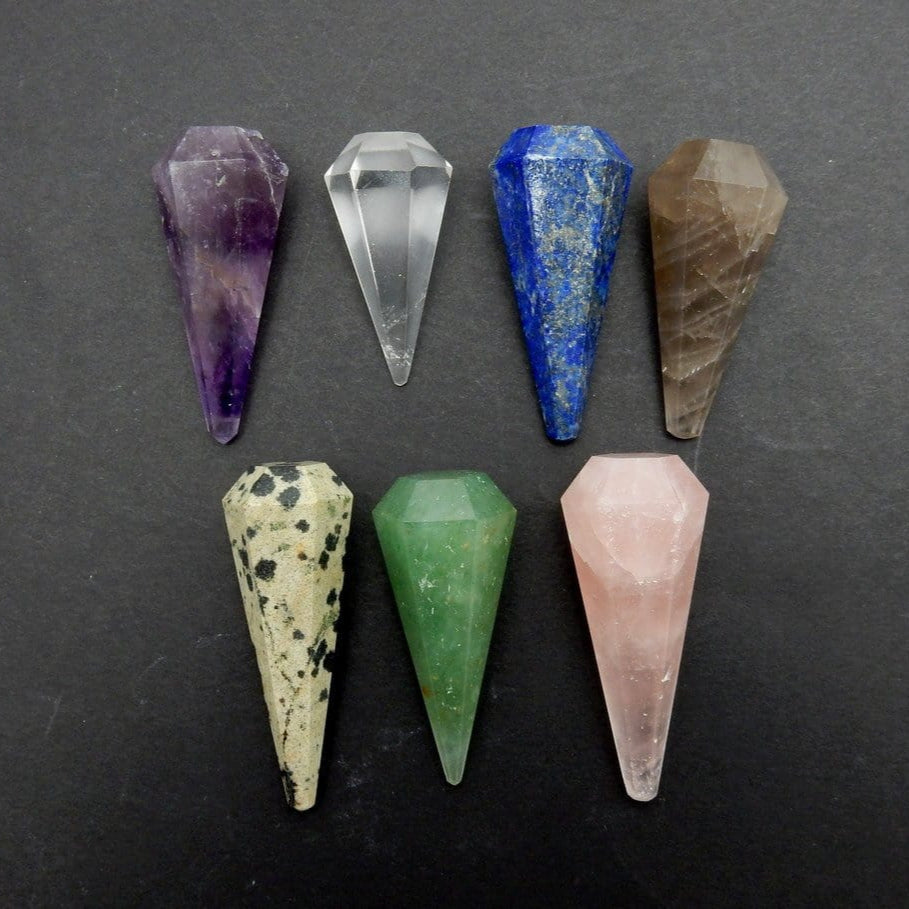 Aerial view of 7 pendulums on a flat surface