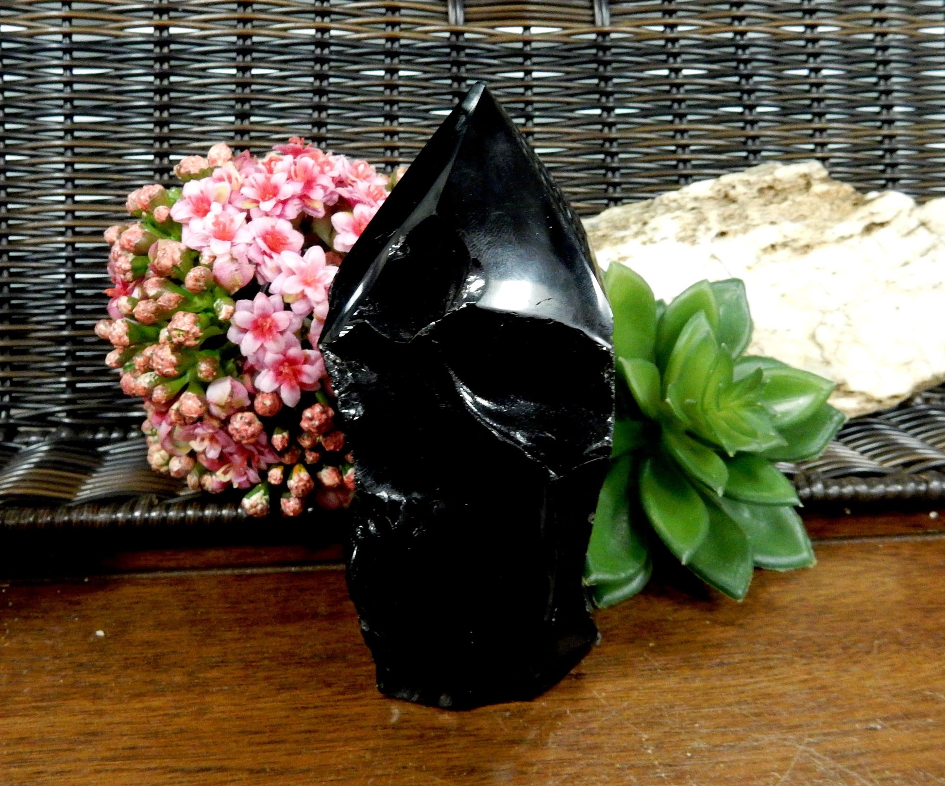 large black obsidian semi polished point set as home decor 