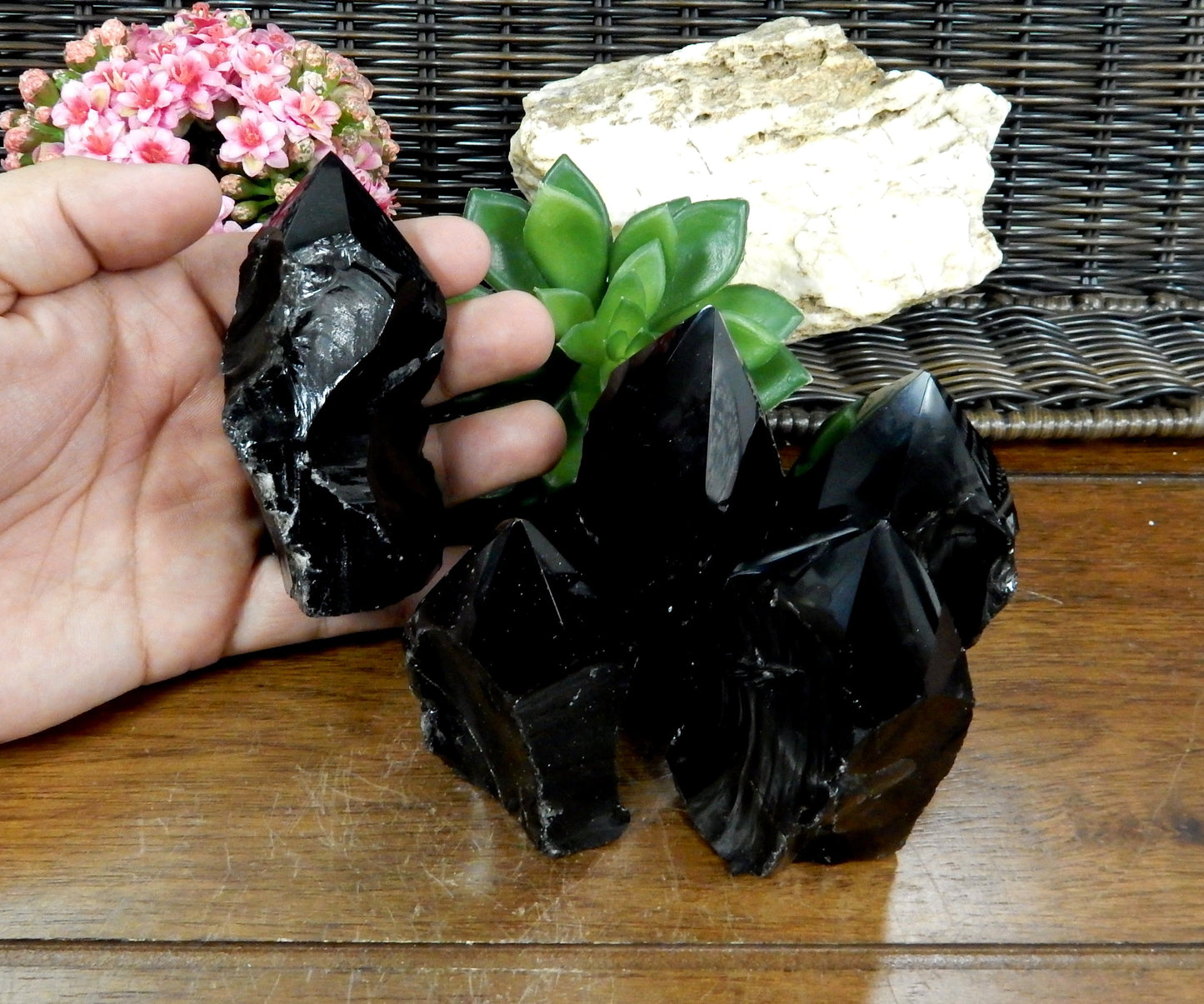 polished point in hand for size reference 