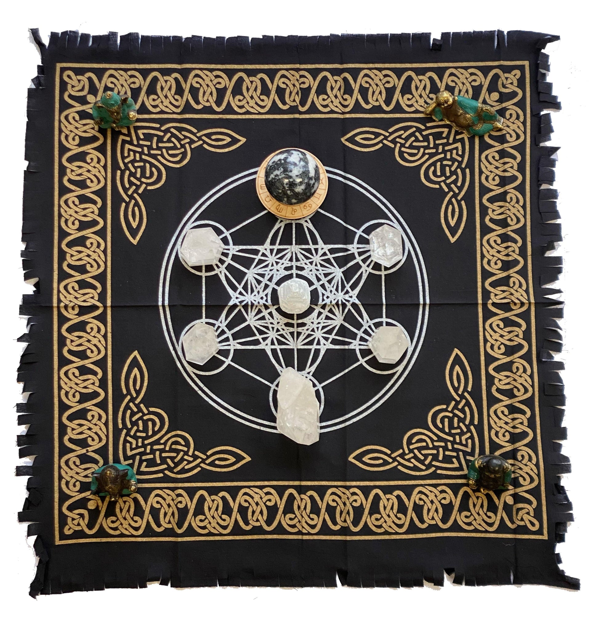 photo of alter grid. It is black with a white grid imprinted on it and gold borders and corners.