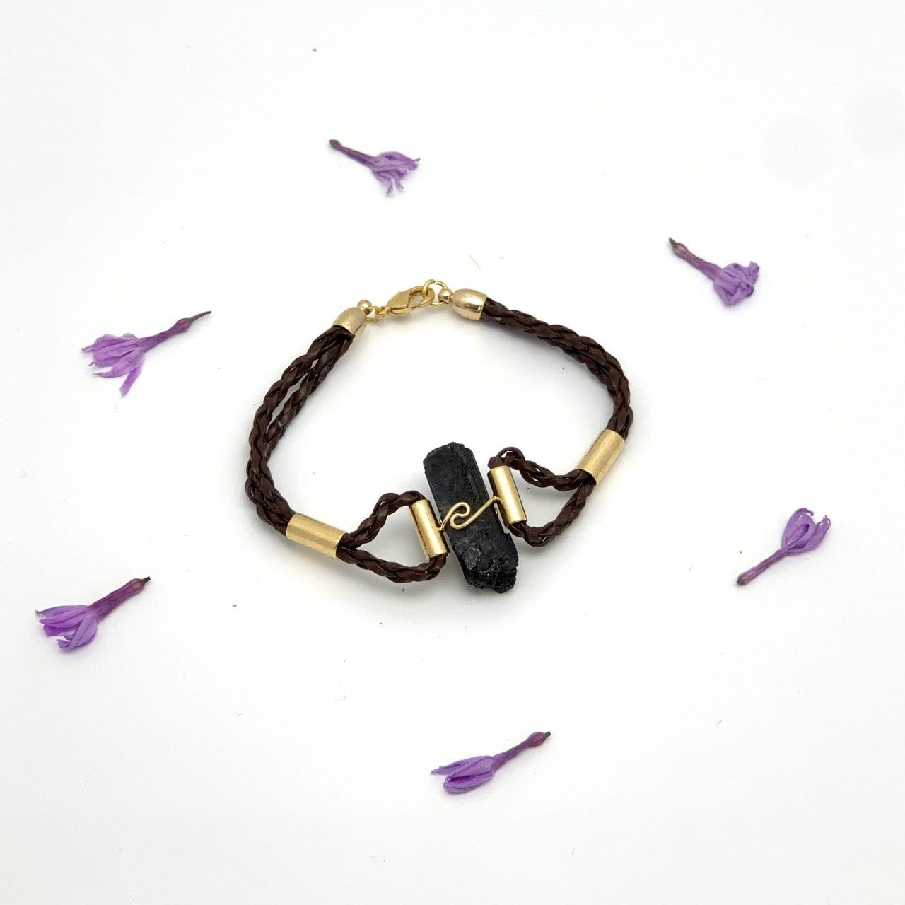 tourmaline gold accents displayed on white background