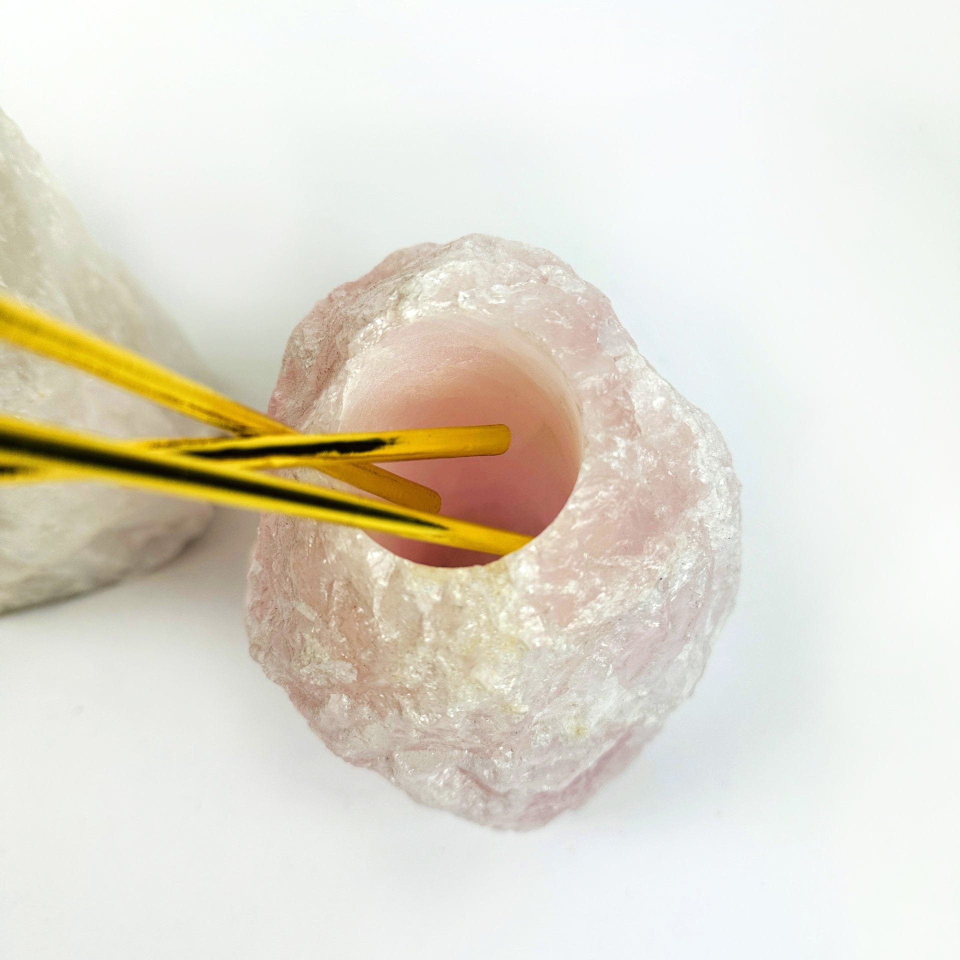 Natural Stone Vase of rose quartz, looking in to the hole opening