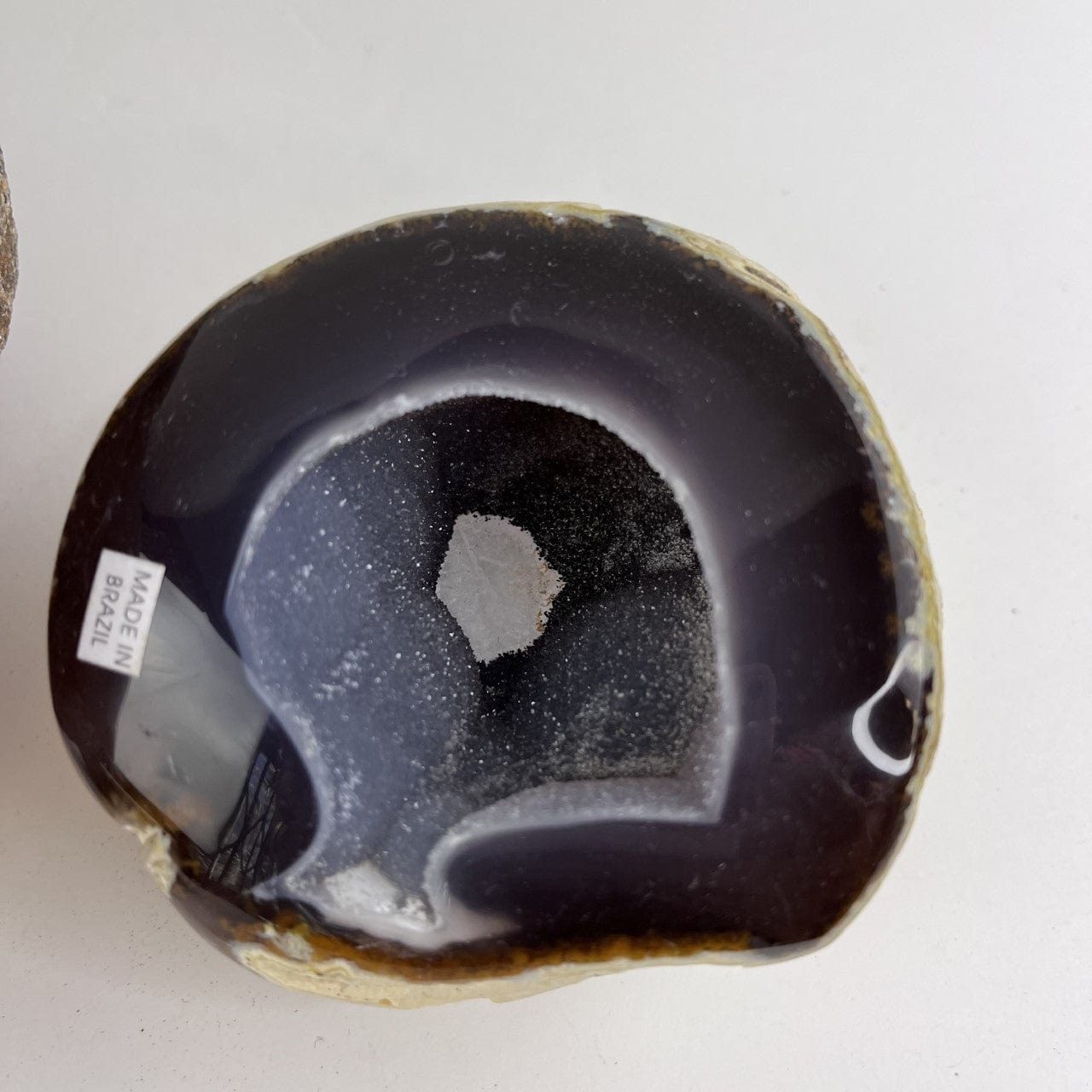 Up close of one of the halves showing druzy