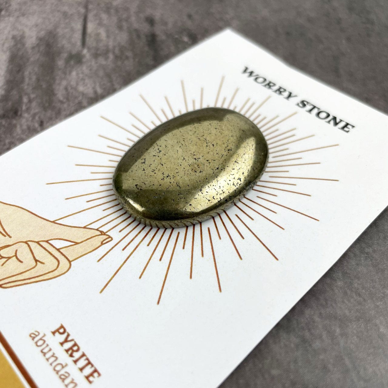 Pyrite worry stone up close view